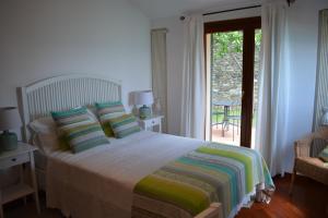 Posteľ alebo postele v izbe v ubytovaní Ca da Muntà bed and breakfast