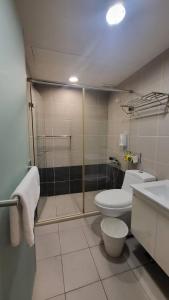 Kúpeľňa v ubytovaní Xingyi Hotel