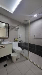 Kúpeľňa v ubytovaní Xingyi Hotel