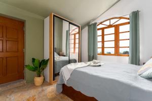 a bedroom with a large mirror and a bed at Dvor Aaki in Novi Vinodolski +54 photos