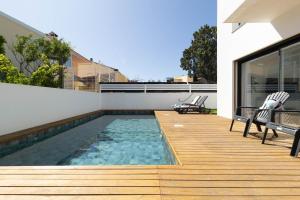 Bazén v ubytování Happy Days Beach House nebo v jeho okolí