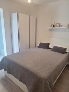 Postel nebo postele na pokoji v ubytování Apartment Mirjana