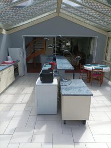 Η κουζίνα ή μικρή κουζίνα στο Grande maison sur parc arboré +9 φωτογραφίες