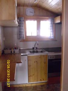 Kuchyň nebo kuchyňský kout v ubytování Apartment Nadeschda