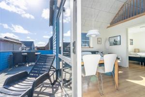 Balkón nebo terasa v ubytování 800-Hvide-Sande-Ae-Gammel-Havn-30