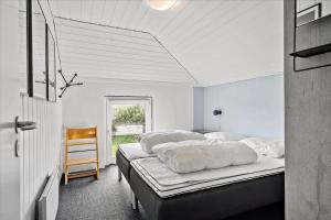 Ένα ή περισσότερα κρεβάτια σε δωμάτιο στο 321-Hvide-Sande-Gammeleng-26