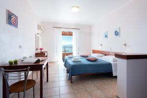 Corfushell Resort Hotel apart客房内的一张或多张床位