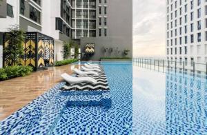Kolam renang di atau dekat dengan Alinea Family Suites Homestay for Family