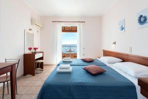 Corfushell Resort Hotel apart客房内的一张或多张床位