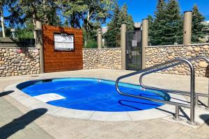 a small blue pool with a metal hand rail at Snowcreek 847 in Mammoth Lakes