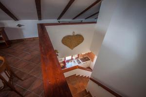 an overhead view of a kitchen with an apple on the wall at Apartman Joso in Diklo