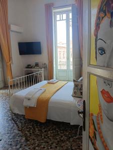 Posteľ alebo postele v izbe v ubytovaní B&B Perla