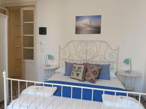 Posteľ alebo postele v izbe v ubytovaní B&B Perla