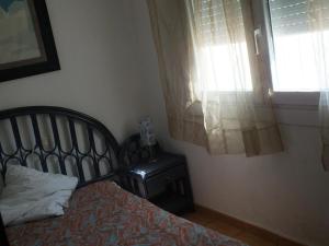 Posteľ alebo postele v izbe v ubytovaní Villa con piscina privada y jardín cerrado en Castelló d'Empúries, ideal para 6-8 personas - ES-204-1