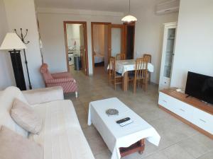 Posezení v ubytování Apartamento para 6 personas con piscina, a 700m de la playa - ES-204-14
