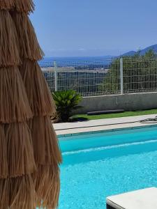 Πισίνα στο ή κοντά στο Appartement T3 dans villa avec piscine