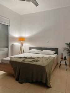 Postel nebo postele na pokoji v ubytování FLAT 45