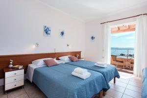 Corfushell Resort Hotel apart客房内的一张或多张床位