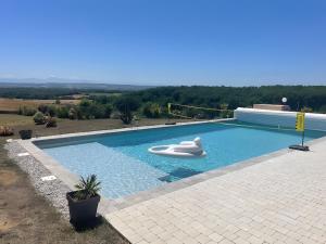 Swimmingpoolen hos eller tæt på Maison Opuceb + 13 billeder