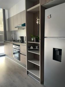HuamboyaQuito with a view - Condo in La Carolina的相册照片