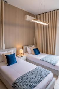 Кровать или кровати в номере NOK Classy 3BR Villa by Vistacana Rentals