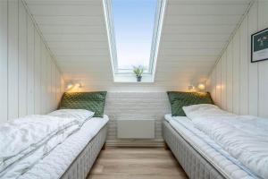 Un pat sau paturi într-o cameră la 147-Ringkobing-Hjelmevej-56