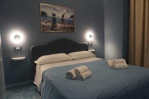 Ένα ή περισσότερα κρεβάτια σε δωμάτιο στο Paradise Luxury Apartments