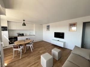 Kuchyň nebo kuchyňský kout v ubytování Appartement chic et lumineux - 100 m de la plage