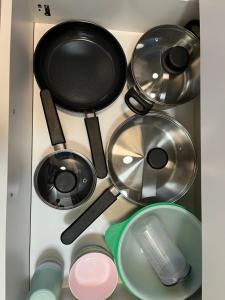 a bunch of pots and pans in a drawer at Kotkanlankila in Kotka +3 photos
