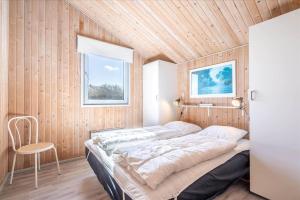 Ένα ή περισσότερα κρεβάτια σε δωμάτιο στο 524-Hvide-Sande-Kr-Madsens-Vej-53