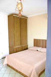 Una cama o camas en una habitación de Casa da Josi - Pajuçara 40 fotos más