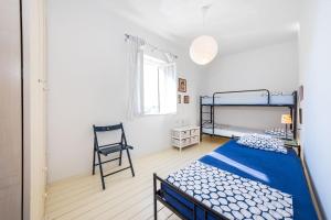 Ένα ή περισσότερα κρεβάτια σε δωμάτιο στο Palm Bibinje