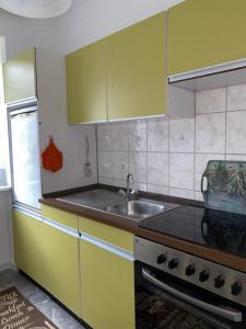 Kuchyň nebo kuchyňský kout v ubytování Lüttje Eiland + 6 fotografií