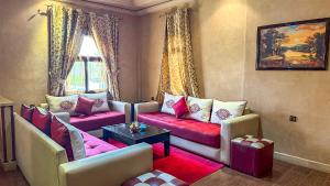 Posezení v ubytování ApartHotel Nzaha