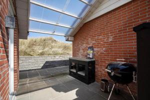Patio nebo venkovní prostory v ubytování 4474-Hvide-Sande-Mettes-Bjerg-30