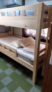 Katil atau katil-katil dalam bilik di Guesthouse Oasis