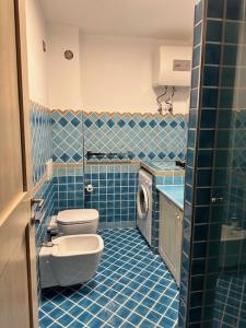 A bathroom at ILIA'S House Porto Rotondo