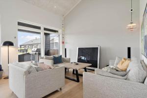 Телевизор и/или развлекательный центр в 1180-Ringkobing-Lodbergsvej-74