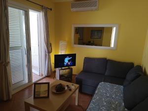 Телевизор и/или развлекательный центр в apartamento Isleta del Moro, Cabo de Gata