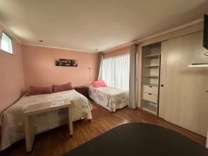 Voodi või voodid majutusasutuse Apart Hotel Colors toas