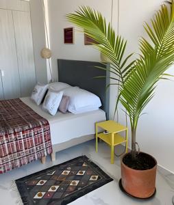 Ένα ή περισσότερα κρεβάτια σε δωμάτιο στο Estilo y comodidad a pasos de la playa en Irotama!