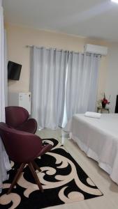 Et tv og/eller underholdning på Hotel Yoguedes + 28 billeder