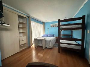 Voodi või voodid majutusasutuse Apart Hotel Colors toas