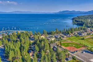 an aerial view of a resort on the shore of a lake at Tahoe City Gem Pet Friendly Yard Walk to Beach in Tahoe City