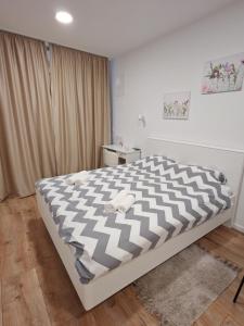 Ένα ή περισσότερα κρεβάτια σε δωμάτιο στο Pe Pe room