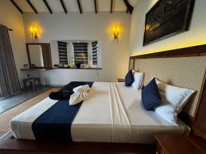 Postel nebo postele na pokoji v ubytování Foresta Resort Sigiriya