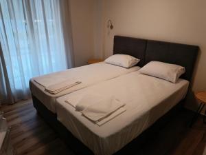 Postel nebo postele na pokoji v ubytování ARETI