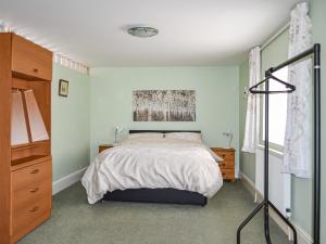 Postel nebo postele na pokoji v ubytování The Old Farm Cottage