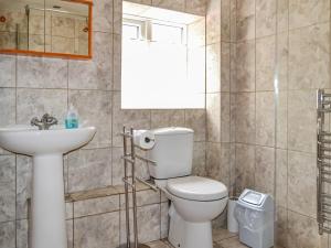 Koupelna v ubytování The Old Farm Cottage + 4 fotografie