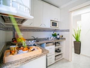 Η κουζίνα ή μικρή κουζίνα στο Luxury Sunset Boutique Stay - Fuengirola Beach